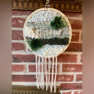 Handcrafted woven hoop decoration.